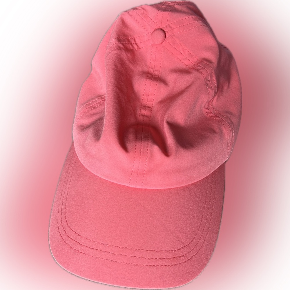 Woman’s hot pink high ponytail running hat